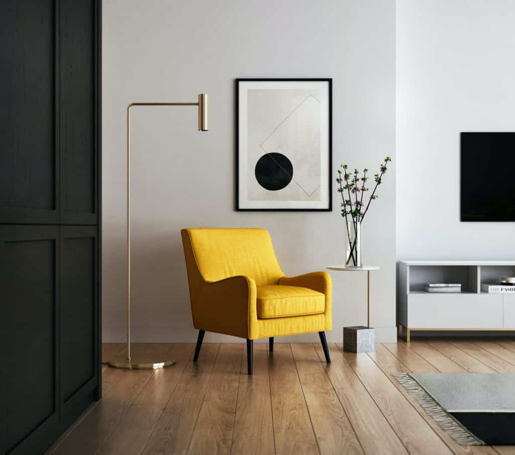 corner of living room with yellow chair and decor