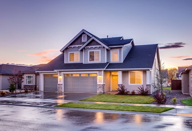 a modern home street view at twilight