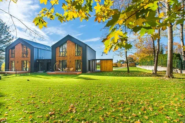 wooden houses in an open field